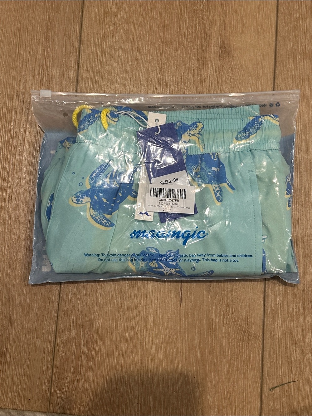 Light Aqua Swim Trunks with Turtle Print